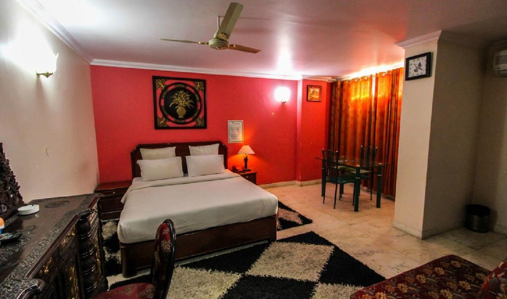 Hotel Pigeon International Bangalore Room photo