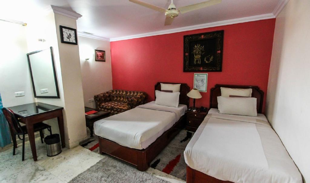 Hotel Pigeon International Bangalore Room photo